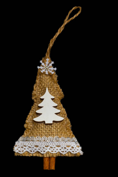 istock handmade Christmas tree toy, Christmas toy herringbone tree, burlap 1445400910