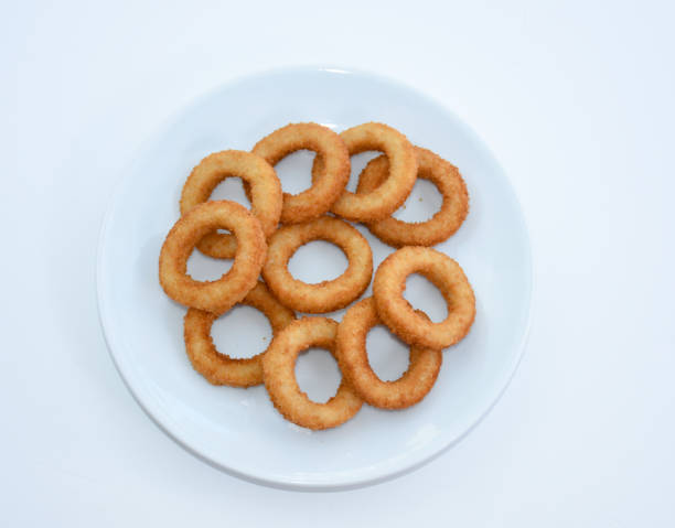 istock fried onion rings on white plate, isolated on white background 1445403058
