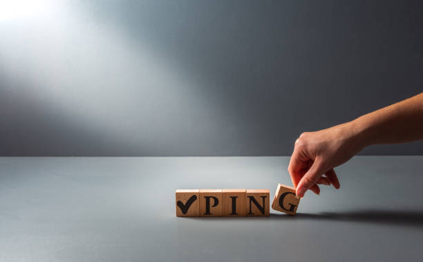 istock hand posing wooden blocks , . ping, concept of tracking or speed test . 1445409518