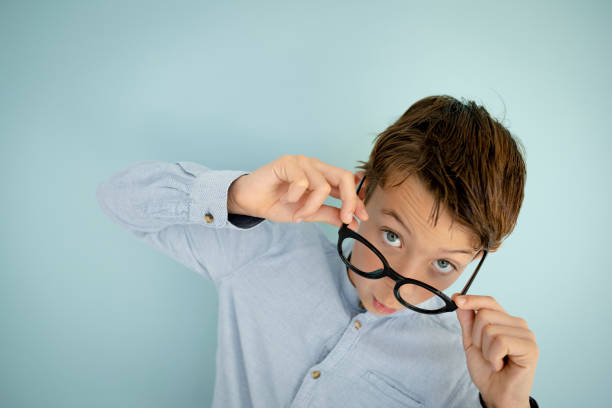 istock young cool boy, with big massive black glasses 1445412295