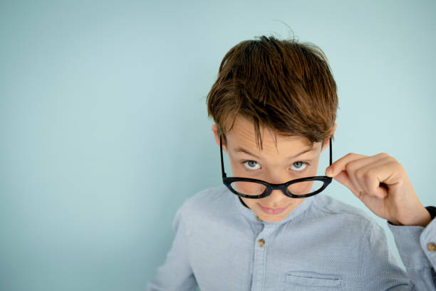 istock young cool boy, with big massive black glasses 1445412302