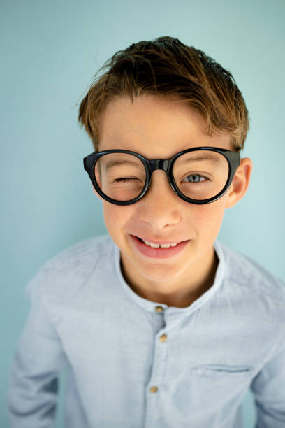 istock young cool boy, with big massive black glasses 1445412666