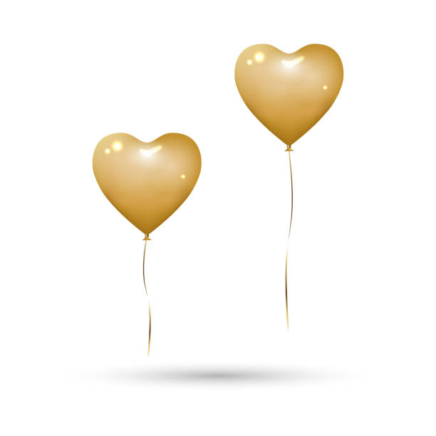 istock Heart balloons in gold solid colour with gold ribbons. Isolated on white background with shadow, mockup template object. Realistic 3D vector illustration. 1445412718