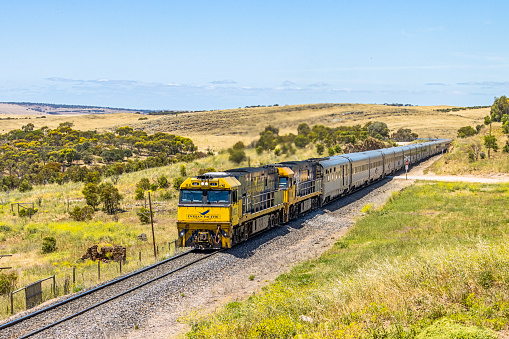 Callington, Australia - Nov 24, 2022: Indian Pacific luxury passenger/tourist train from Sydney to Adelaide diverted through Adelaide Hills due to severe flooding in outback NSW between Broken Hill and Parkes. The flood damage is expected to take many weeks to repair due to lack of access to the sites.