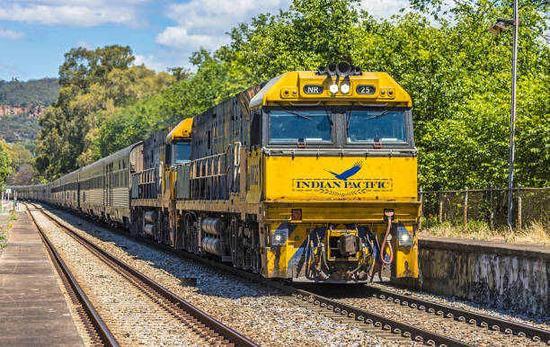 Hawthorn, Australia - Nov 24, 2022: Indian Pacific luxury passenger/tourist train from Sydney to Adelaide diverted through Adelaide Hills due to severe flooding in outback NSW between Broken Hill and Parkes. The flood damage is expected to take many weeks to repair due to lack of access to the sites. The train operated by Journey Beyond Rail passing through suburban Hawthorn.