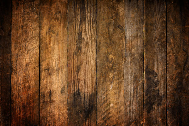 istock Grunge old weathered wood dark texture 1445418383