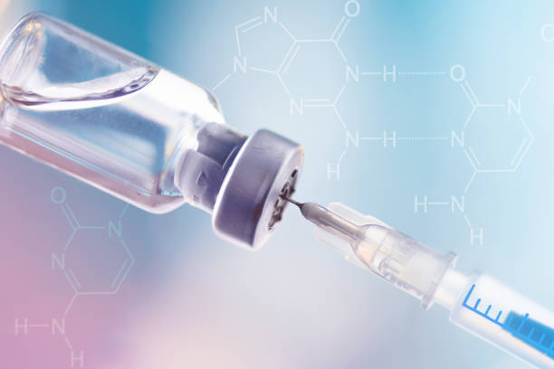 istock Glass vial and syringe with injection over blue background. 1445418770
