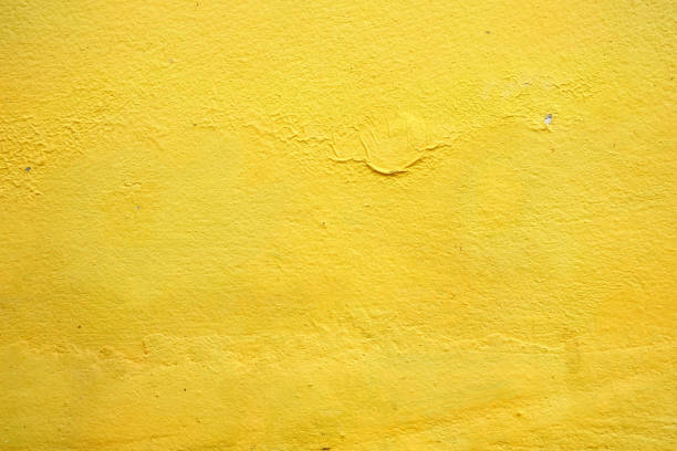 istock Yellow Painting on Concrete Wall Background, Suitable for Construction Concept. 1445419643