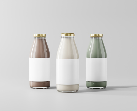 Milk tea in a clear glass bottle, a glass bottle of milk mockup, 3d rendering, 3d modeling