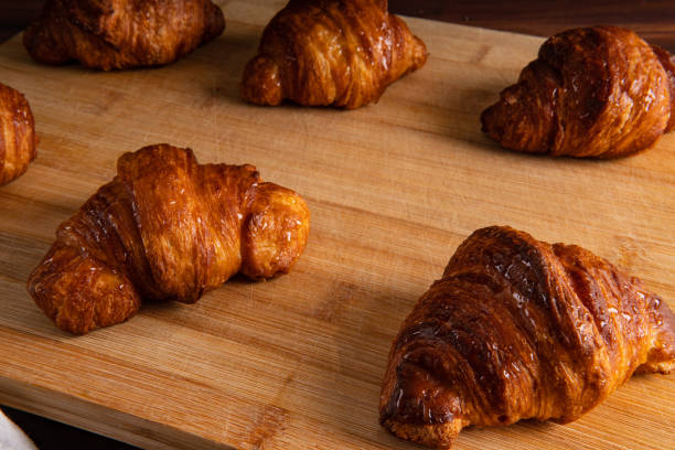Close up of vegan croissants over a cutting board stock photo