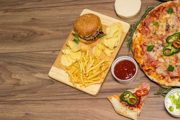 istock Tasty fast food on table 1445429711