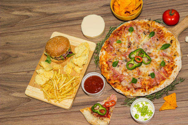 istock Tasty fast food on table 1445429732