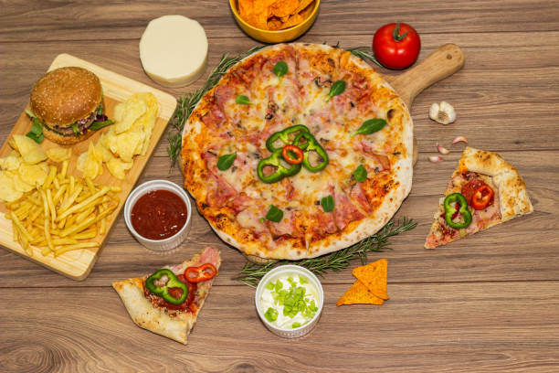 istock Tasty fast food on table 1445429754