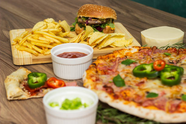 istock Tasty fast food on table 1445429779