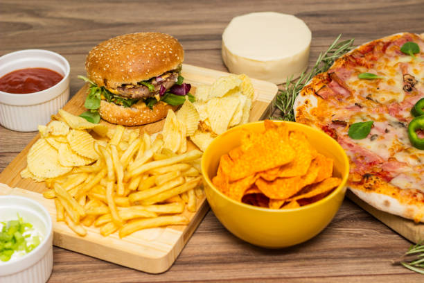 istock Tasty fast food on table 1445429819