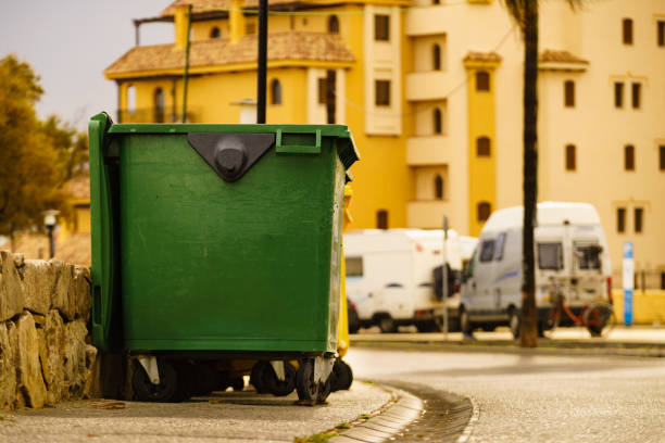 istock Industrial big garbage bin on city street 1445430001
