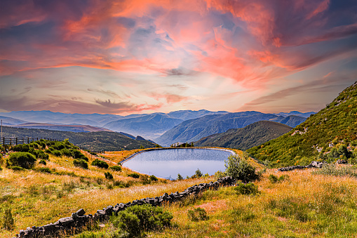 Lago en la Cordillera Cantábrica al atardecer, Asturias, España photo