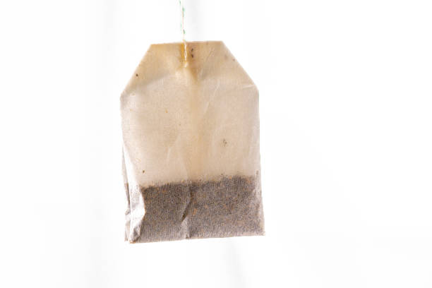 istock white translucent tea or infusion sachet on white color background. 1445441362