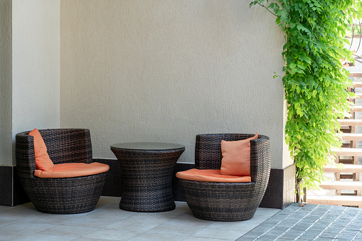 Element of terrace furniture. Garden chairs and table. Rest zone