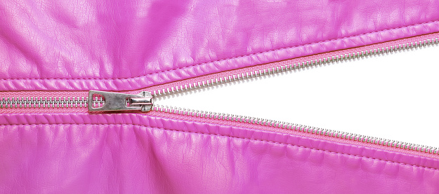 Pink leather texture and open metal zipper isolated on white background. Business background, banner, header, mockup with copy space. Top view, flat lay. Sale, shopping, discount concept