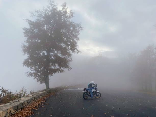 A man riding a motorcycle for a self driving tour by the seaside
