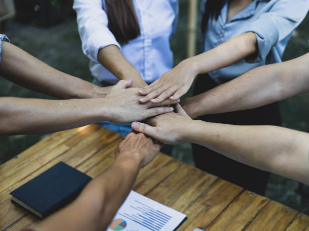 istock The concept of unity and cooperation, teamwork of diverse people. 1445450672