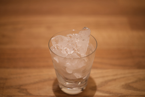Ice cubes are flying on a white background. Isolated