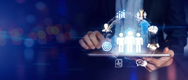 istock Businessman hold circle of network structure HR - Human resources web banner with copy space. Business leadership concept. Management and recruitment or employment headhunting. 1445457640