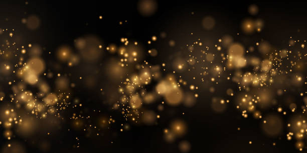istock Christmas background. Powder . Magic  shining gold dust. Fine, shiny dust bokeh particles fall off slightly. Fantastic shimmer effect. 1445462362