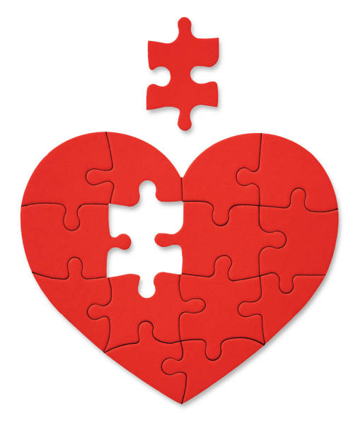 istock Heart-shaped jigsaw puzzle depicting 1445462563