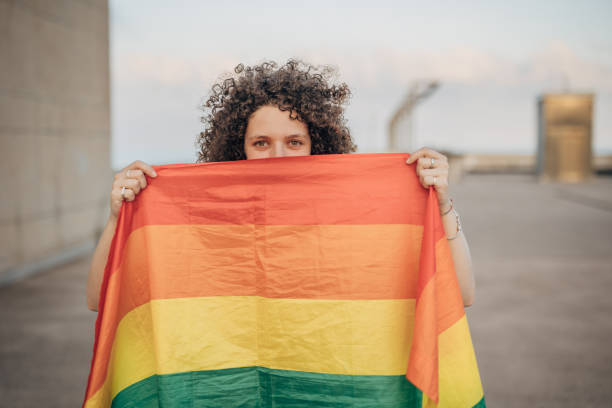 istock Woman with pride flag 1445468458