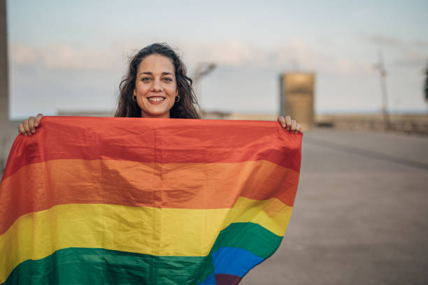 istock Woman with pride flag 1445468575