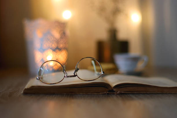 istock Peanut Butter Cookies, Tea, Book, Glasses and Candle 1445471355