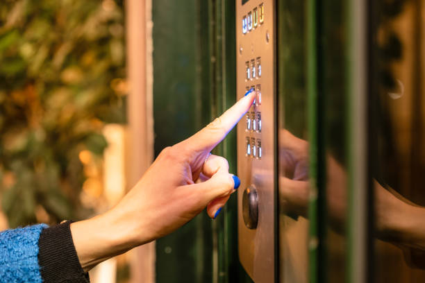 istock Typing numbers to enter the door, sunset. 1445473202