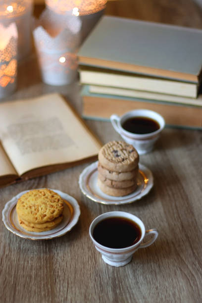 istock Cookies, Tea, Books and Candles 1445474597