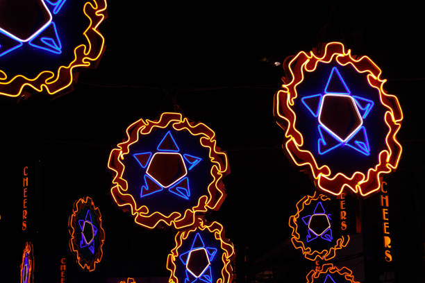 Neon lights shaped into traditional parol, a Filipino ornamental lantern displayed during the Christmas season