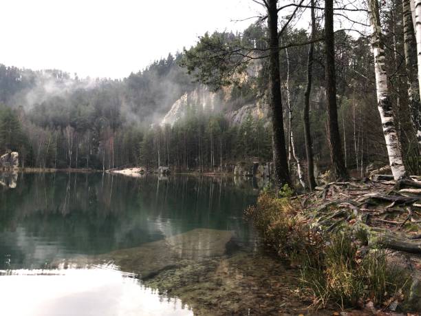 istock Lake and mountains. Autumn nature 1445477394