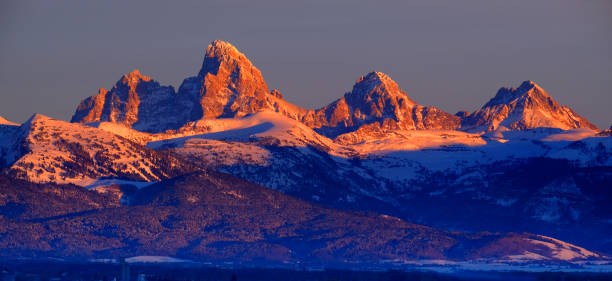 istock Tetons Teton Mountains in Winter Snow and Trees with Reflection in River 1445481548