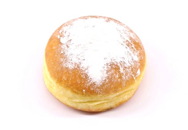 istock A Berliner doughnut, also known as Krapfen, on white background. 1445483213