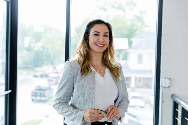 istock Confident, successful female lawyer poses in office 1445483902