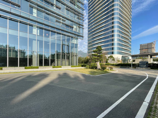istock Modern city buildings and empty asphalt roads 1445488026