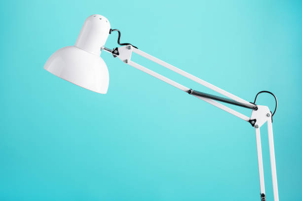 istock Office table lamp on green background with space for text and idea concept 1445488909