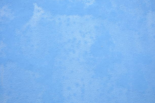 istock Blue Stucco Wall Background, Suitable for Construction and Architecture Concept. 1445490302