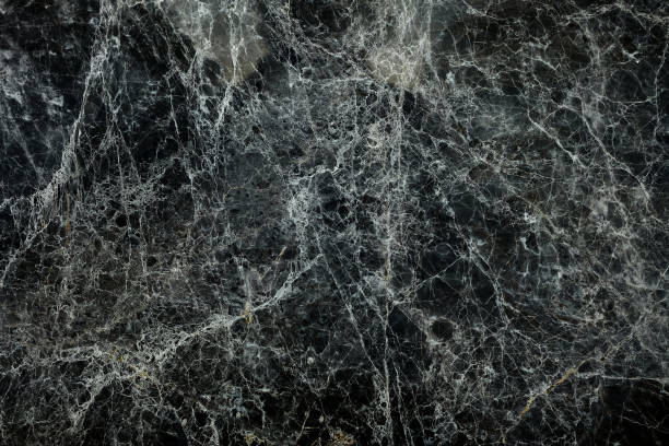istock Black Cracked Marble Wall with Grain, Suitable for Overlay Image. 1445490304