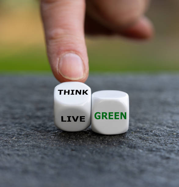 istock Dice form the expression 'think green' and 'live green'. 1445491372