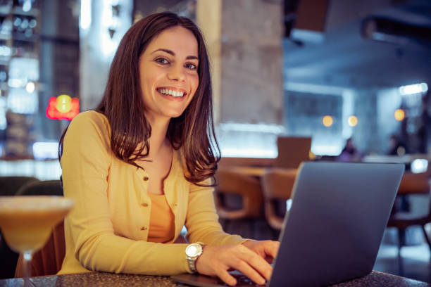 istock Woman using laptop at cafe 1445499213