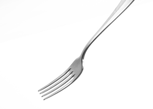 Silver fork isolated on white background. Studio shot.