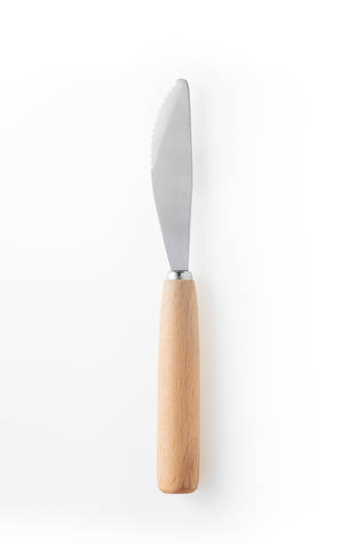 istock Wooden silver knife isolated on white background. Studio shot. 1445504755
