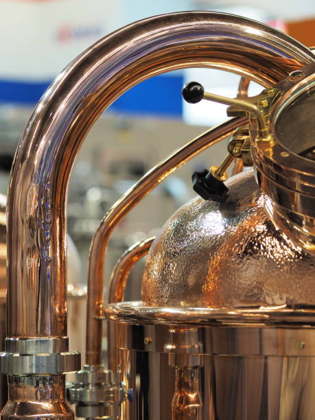 istock Copper and brass complex distillation arrangement with inspection windows 1445505195