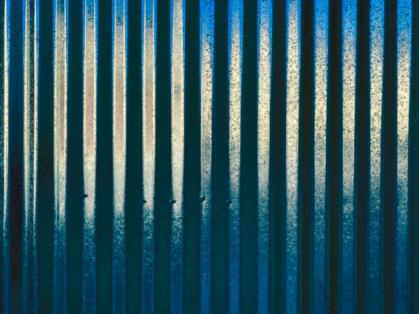 steel corrugated iron storage shed wall building industrial siding shiny blue exterior stock photo